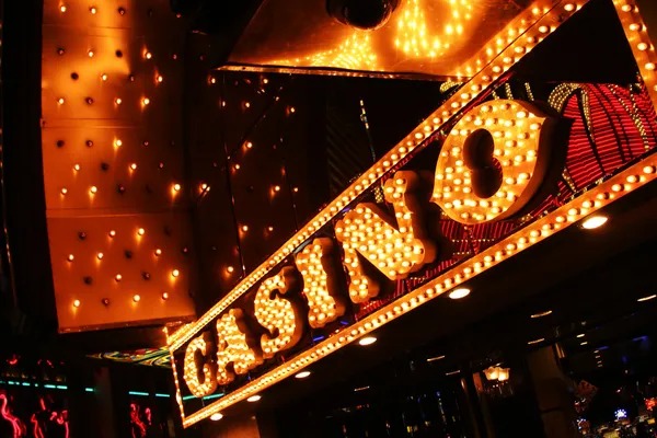 ladbrokes mobile app interface showing slot games and live casino options